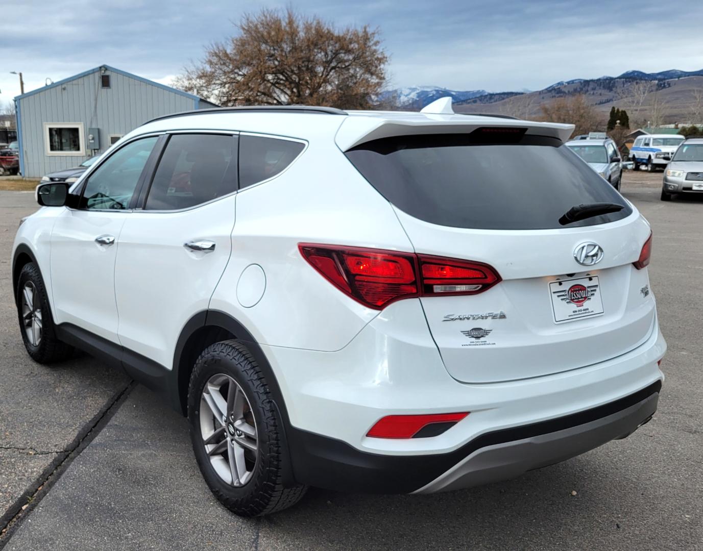 2017 White /Tan Hyundai Santa Fe Sport (5NMZUDLB9HH) with an 2.4L I4 engine, 6 Speed Auto transmission, located at 450 N Russell, Missoula, MT, 59801, (406) 543-6600, 46.874496, -114.017433 - Really Nice AWD SUV. 2.4L I4. 6 Speed Automatic Transmission. Remote Start. Backup Camera. Bluetooth. AM FM XM CD. Air. Cruise. Tilt. Power Windows and Locks. One Owner. Clean Carfax. - Photo#1